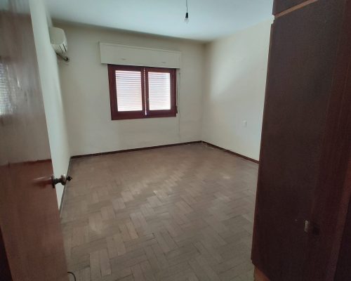 DORMITORIO HACIA LA CALLE